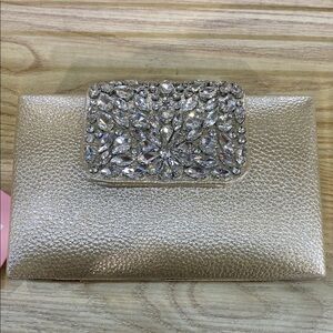 Elegant Gold Clutch with Crystal Embellishments
